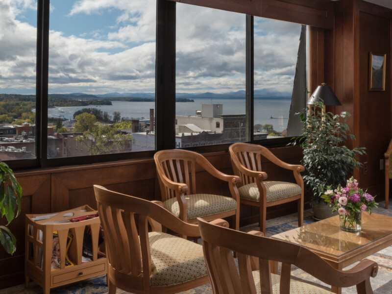 Gravel & Shea office interior with large windows overlooking Burlington Vermont and Lake Champlain